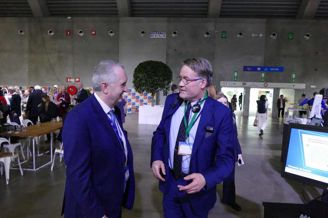 CoRAI Chair Thomas Schmidt talking to Thomas Wobben (Director for Legislative Works at European Committee of the Regions).