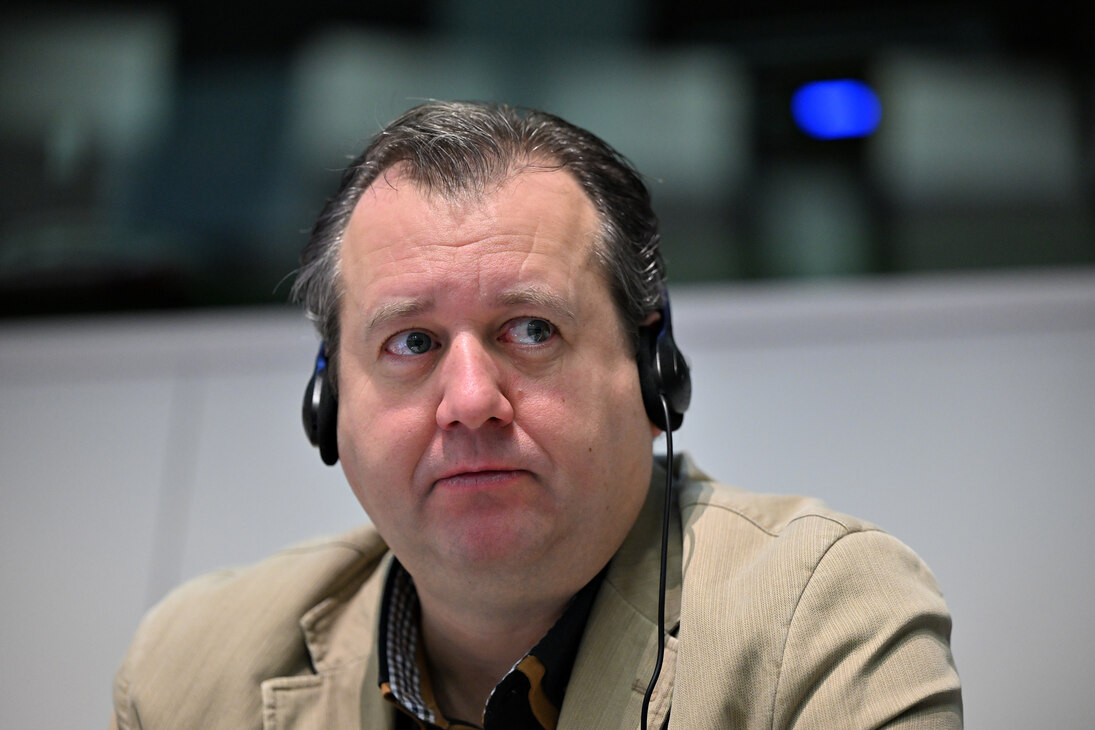 Close-up of Petr Dolejsi listening to his fellow panellists.